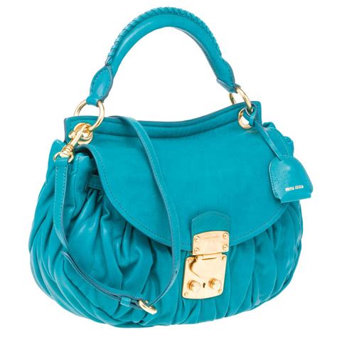 miu miu turquoise bag|miu michigan handbags.